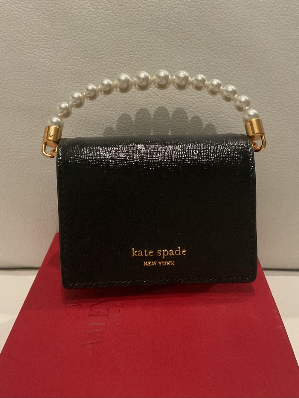 Kate spade black mini bag with pearl handle